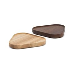 two wooden trays sitting next to each other