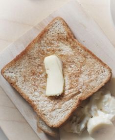 a piece of bread with butter on it