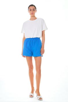 You don't have to be dating someone to wear these shorts. With a smocked waistband and loose comfortable fit these will quickly become your go-to warm weather shorts. And because we know how important pockets are we've included them so you can keep your phone and keys close by. Rest assured knowing that these shorts are also non-sheer and come with lining. So whether you're headed to a backyard bbq or a day at the beach these shorts have got you covered. Smocked waist band Side pockets Non sheer Lining Boyfriend fit Hand wash cold Do not bleach Do not tumble dry Iron low Shell: 100% Cotton Lining: 80% Polyester 20% Cotton Exclusive of Elastic HN695P Total length: 14.5" Waist: 27" Inseam: 3" S KHAKI: Height 5'9" / Bust 31.5" / Waist 23" / Hip 34.5" ORANGE: Height 5'10" / Bust 32" / Waist 25 Dress Night Out, Streetwear Essentials, New Boyfriend, Boyfriend Shorts, Leather Denim, Backyard Bbq, Sweater Sale, Comfort Style, Boyfriend Fit