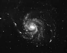 an image of a spiral galaxy in the sky