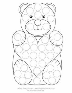 a teddy bear with polka dots on it