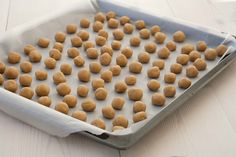 a pan filled with cookies sitting on top of a table