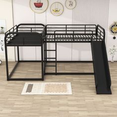 a bunk bed with a slide on the floor