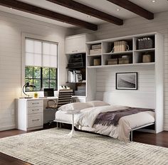 a bedroom with a bed, desk and bookshelf on the wall above it