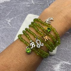 This delicate Peridot color glass seed beads bracelets are handmade personally by me, Derlis. You can choose your size bracelet. Also, you can personalize it picking your charm: initial/letter, Leo or Virgo zodiac sign, peridot crystal charm, in golden or silver tone. This bracelet is the perfect birthday gift for friends, family members, wife, lover, relatives born in August who loves handmade jewelry for Birthdays, Valentine's Day, Mother's Day, Prom, Christmas, Weddings, Graduation, Thanksgiv Leo Bracelet, Letter Birthday, Peridot Color, Zodiac Virgo, Christmas Weddings, Peridot Crystal, Birthstone Colors, Beads Bracelets, Virgo Zodiac