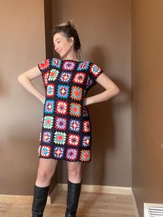 * Bhava Style Black Crochet Granny Square Colorful Dress * Ready to ship * %100 Cotton * The model is wearing a small 50 kg, 1.65 length * %100 Cotton yarns * Completely Hand-knitted  * It is recommended to wash at 30 degrees or just hand wash with cold water. * After we ship your product, we give you a tag number. This number is updated within the first 24 hours. Then you can follow the updates by clicking on them. Welcome to Bhava's 🌻 Here you will find tops, skirts, shirts, dresses, cardigan Black Retro Dress With Short Sleeves, Casual Black Crochet Mini Dress, Crochet Granny Square Dress, Granny Square Dress, Dress Black Women, Square Dress, Black Women Dress, Colorful Dress, Crochet Granny Square