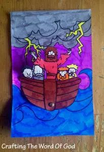 a paper bag with an image of jesus in a boat on the water and lightning