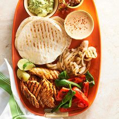 an orange tray filled with different types of food