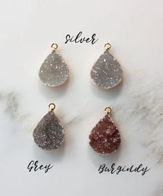 A Gold dipped Druzy pendant is suspended inside a hand forged teardrop with our Della Druzy Teardrop Necklace. With a touch of sparkle and unique design, this will become a fast favorite for everyday wear. Chain, frame and clasp are made from high quality 14k Gold Fill that will not flake, wear off or discolor over time. 3" extender chain included for a perfect fit. *Please select the color of the druzy teardrop you would like. See photos for current options. » Size: 17 - 20" adjustable length | Florida Style, Druzy Jewelry, Druzy Necklace, Rosary Necklace, Tassel Jewelry, Teardrop Necklace, Gold Dipped, Top Gifts, Gold Filled Jewelry