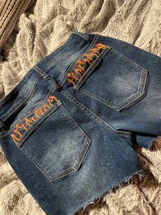 One if a kind hand embroidered flame Jean shorts. These shorts are stretchy and comfortable Trendy Embroidered Shorts, Trendy Embroidered Short Shorts, Bunker Hill, Jean Short, Feb 2, Embroidered Shorts, Short En Jean, Short Outfits, Hand Embroidered