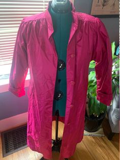 "Windsor Bay fuchsia pink insulated coat from the 1980s  Women's Size 6P with button closure and pockets and pleats Interior insulation is removable with a simple unzip, making this the perfect coat for three seasons! 42.5\" in length from shoulder to hem 24\" from shoulder to sleeve cuff 42\" chest Smoke-free home" Spring Outerwear With Covered Buttons, Spring Solid Outerwear With Covered Buttons, 1980s Women, Perfect Coat, Sleeve Cuff, Fuchsia Pink, The 1980s, Windsor, Red Leather Jacket