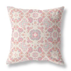 a pink and grey pillow with an ornate design on it's back side,