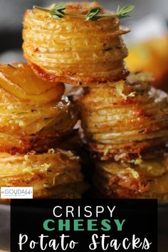 crispy cheesy potato stacks on a plate with text overlay that reads crispy cheesy potato stacks