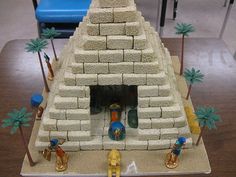 a cake made to look like an egyptian pyramid