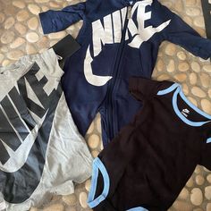 Have Your Little Ready For Any Weather With This Trio Of Sporty And Comfy Nike Gear! See Pic For All The Angles Black, Navy, White, Brown And Light Blue!!! Nike Gear, Kids Nike, Navy White, Blue Brown, Onesies, Blue Black, Kids Shop, Light Blue, Rompers