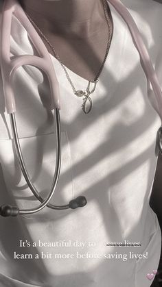 a woman with a stethoscope on her neck