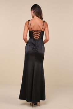 Enchant everyone you meet the moment they see you in the Lulus Spellbinding Aura Black Satin Lace Tie-Strap Bustier Maxi Dress! Sleek woven satin shapes this head-turning dress that falls from tying spaghetti straps into a ruffled, sweetheart neckline and a sheer lace, bustier-style bodice with gathered satin cups and supportive boning. High, fitted waist tops a flattering tulip-style maxi skirt with pleated gathering at the side. Turn around to reveal a flirty lace-up detail at the back. Hidden Head Turning Dress, Romantic Floral Print, Maxi Skirt Style, Black Tie Gala, Lace Tie, Lace Bustier, Strapless Maxi, Swimwear Dress, Strapless Maxi Dress