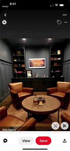 a room with two couches, a table and some chairs in front of a tv