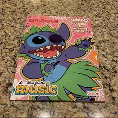 a magazine with an image of stitchy from the cartoon network on it's cover