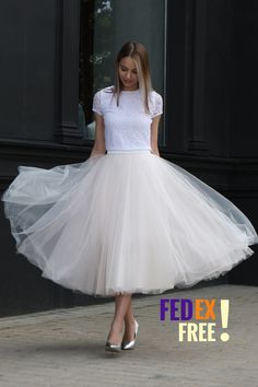 Phone number required for express delivery!! The skirt in front of you is of the utmost quality handiwork. It does NOT make you look fat but it is very fluffy nevertheless (it is indeed so). At the waist tulle is specially arranged in such a way that it does not protrude outwards as on many pictures at other shops that you have probably seen. This skirt will make you happy from the first try - you will feel a princess. I promise! The skirt on the pic (medium volume), colors 3/52/3/52. The skirt White Flowy Pleated Skirt For Party, Spring Wedding Skirted Dress, White Prom Skirt For Spring, Long Summer Skirt For Bridesmaid, Elegant Flowy Lined Tulle Skirt, Fitted Long Tulle Pleated Skirt, Lace Full Skirt For Wedding, Elegant Flowy Midi Petticoat, Spring Wedding Flowy Pleated Skirt