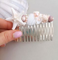 "Seashell hair comb, Beach wedding, Beach hair accessory Seashell Hair accessories Mermaid hairpin,  Nautical, shell bridal hair comb, beach bridal comb, Bridal Pearl Headpiece   These beautiful seashell hair comb will make a great statement on your special day and beach wedding. A magnificent beach accessory for bride and bridesmaid. The seashell hair comb  3.4\" - (8.5 cm.) I am open to custom orders. Here you can see our offer for sea bridal belt: https://www.etsy.com/listing/698251465/beach-wedding-sash-shell-bridal-sash?ref=shop_home_active_7&frs=1 https://www.etsy.com/listing/627502050/beach-wedding-sash-shell-bridal-sash?ref=unav_listing-same-5&cns=1 You can also request custom colors or other elements. Please just convo me with your wish colors. To see more wedding accessories, ple Seashell Hair Accessories, Starfish Headpiece, Seashells Hair Accessories, Bridesmaid Color, Wedding Miscellaneous, Seashell Hair, Beach Hair Accessories, Pearl Headpiece, Ring Holder Wedding