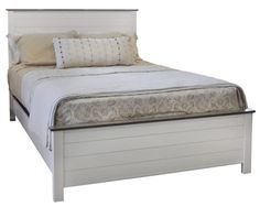 a white bed with two pillows on the headboard and foot board is shown in this image