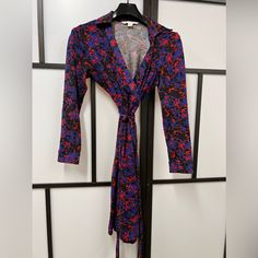 Dvf Wrap Dress Jeanne Two Size 10 Worn Twice Cotton & Silk Blend Floral With Red & Blue Purchased At Dvf Nyc Blue Fitted Wrap Dress For Fall, Fitted Blue Wrap Dress For Work, Dvf Wrap Dress, Blue Print, Diane Von, Von Furstenberg, Cotton Silk, Diane Von Furstenberg, Red Blue