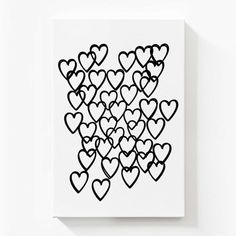 a black and white drawing of many hearts