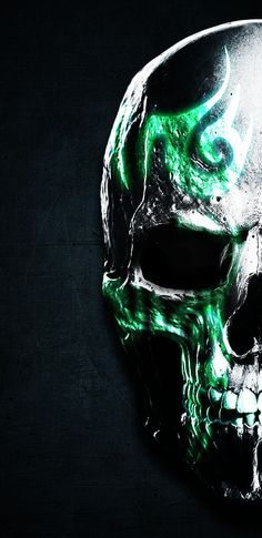 a green and white skull on a black background