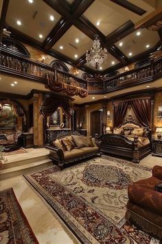 a living room filled with furniture and a chandelier above the couches on top of a rug