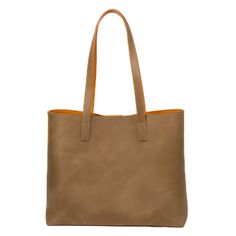 Elevate your style with the Sharon Leather Tote, a timeless piece crafted in the heart of Ubrique, Spain. Designed for both function and fashion, this tote combines luxury with everyday practicality. Whether you're heading to the office, a weekend getaway, or just running errands, the Sharon Tote is your perfect companion. FEATURES -- [ PREMIUM QUALITY LEATHER ] - Made from top grain distressed leather sourced from a Leather Working Group (LWG) Gold certified tannery, ensuring ethical and sustainable production. [ SPACIOUS INTERIOR ] - Features a cotton lining with natural calfskin accents, including two open pockets and one zipper pocket for easy organization. [ DETACHABLE POUCH ] - Comes with a natural calfskin zippered pouch, perfect for securing your essentials. [ COMFORTABLE CARRY ] - Elegant Brown Bags With Waxed Finish, Beige Leather Shoulder Bag With Waxed Finish, Brown Leather Tote Bag, Brown Leather Totes, Zippered Pouch, Leather Laptop, Easy Organization, Distressed Leather, Top Grain Leather