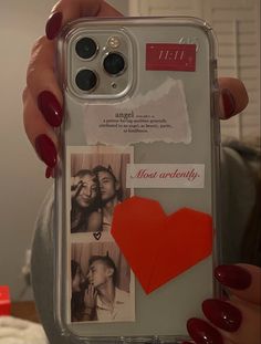 a woman holding up a cell phone case with two photos and a heart on it