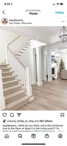 the stairs in this house are white and have wood treading on each one side