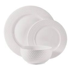 white dinnerware set on a white background