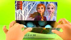 someone is holding up a frozen princess egg box with eggs in it and two hands