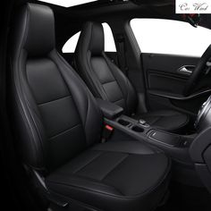 the interior of a car with black leather seats