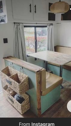 the inside of a mobile home with two tables and chairs