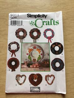 the front cover of simply crafts magazine showing various wreaths and other crafting items