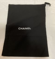 Chanel dust bag is a must-have for any fashion enthusiast. The bags measure 15 1/2 X x 11 1/2, making it the perfect size for storing your favorite Chanel items. The drawstring closure ensures that your items are securely tucked away and protected from dust and other elements. With the iconic Chanel brand name on the bags, you can rest assured that your items will be stored in style. These bags are a great addition to any collection and are perfect for travel or storage. Add these Chanel drawstring dust bags to your collection today! Purchased from my wonderful Chanel distributor, it is 100% authentic. I combine shipping on multiple purchases. I’m not affiliated with Chanel. I can’t ship outside United States. Chanel Items, Chanel Brand, Fashion Enthusiast, Shoe Care, Brand Names, Dust Bag, Chanel, United States, Travel