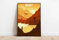 a poster with the words rust on it in front of a white wall and wooden floor