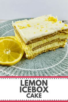 a piece of cake on a plate with a lemon slice next to it and a fork