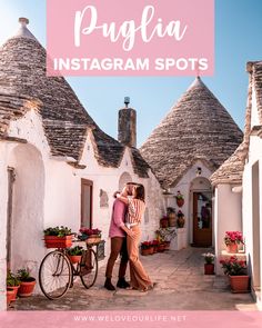 two people standing in front of white buildings with text overlay that says, how to get married in puglia instagram spots