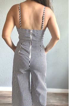 The feel of this classic cotton striped jumpsuit with a touch of spandex creates a soft comfortable feel for all day wear. The stripes are mesmerizing and will add a little confidence to your stride this spring or summer! So go ahead and bring some oh-so chic and unique style to your wardrobe. 95% Cotton, 5% Spandex Measurements Small- Shoulder to hem 47", Inseam 21", Waist 26-28", Bust 32-34" Medium - Shoulder to hem 47", Inseam 21", Waist 29-31", Bust 34-36" Large - Shoulder to hem 47", Inseam Striped Jumpsuits For Spring Day Out, Chic Striped Summer Jumpsuits And Rompers, Chic Striped Jumpsuits And Rompers For Summer, Summer Striped Cotton Jumpsuits And Rompers, Trendy Striped Jumpsuits And Rompers For Summer, Striped Cotton Jumpsuits And Rompers For Summer, Casual Striped Jumpsuits And Rompers For Day Out, Casual Striped Jumpsuits And Rompers For Summer, Casual Striped Fitted Jumpsuits And Rompers