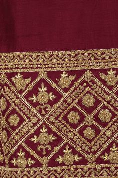 an embroidered maroon and gold cloth