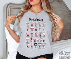 This T-Shirt is a funny and unique gift for dentists, dental students, dental assistants, and dental hygienists. It is perfect for those in the dental field looking for a humorous and stylish shirt to wear.With a comfortable unisex fit, this tee is made with 100% lightweight, breathable cotton, making it ideal for both active and leisure wear. The design features dental-themed graphics and is relevant for dental school graduations, appreciation days, and dental office celebrations. Product features - Made with 100% Airlume combed and ring-spun cotton - Ribbed knit collar with seam for shape retention - Shoulder tape for stability - DTF inner neck labels for comfort - Relevant for dental observances and celebrations Care instructions - Machine wash: cold (max 30C or 90F) - Non-chlorine: ble Black Dental Hygienist, Dentist Student, Dental School Graduation, Dental Assistant Shirts, Funny Dentist, Dental Assistant Gifts, Dental Shirts, Dentist Humor, Dental Gifts