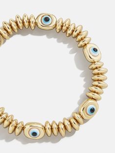 All the gold that glitters and the evil eyes to protect. The Dilara Bracelet easily stretches to compliment any wrist stack. No bad vibes here. Wrist Stack, Eternity Bracelet, Wrist Stacks, Bracelets Beaded, Ups Shipping, Bad Vibes, Gold Bead Bracelets, Bracelet Blue, Jewelry Lookbook