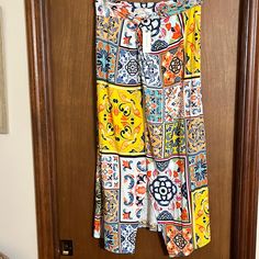 Pretty Midi Skirt In Size Small. Skirt Is A Little Longer On The Front. Material Is Stretchy. Measurements: Waist Will Stretch Up To 16 Inches; Length Is 33 Inches On The Back ( See The Last Photo). Summer Patterned Bottoms With Lined Skirt, Summer Patterned Skirt, Casual Patterned Long Skirt, Patterned Summer Skirt, Patterned Long Skirt For Summer, Patterned Lined Skirt, Multicolor Printed Long Skirt, Patterned Printed Skirt, Wide Leg Lined Skirt For Vacation