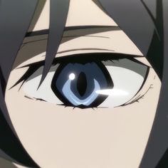 an anime character's eye with long black hair and blue - colored eyeshade