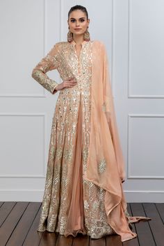 Peach anarkali with gota embroidered pattern all-over. Paired with net lehenga and dupatta.
Components:3
Pattern:Embroidered
Type of Work:Gota
Neckline:Mandarin
Sleeve Length:Straight Full
Fabric:Georgette, Net
Color:Peach
Other Details:
Front button down anarkali
Occasion:Wedding - Aza Fashions Kurta And Lehenga, Peach Anarkali, Kurta Lehenga, Anarkali Lehenga, Designer Anarkali Suits, Delhi Wedding, Embroidered Anarkali, Net Lehenga, Designer Anarkali