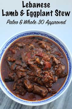 a bowl of lamb and eggplant stew with text overlay that reads, lebanese lamb and eggplant stew pale & whole 30 approved